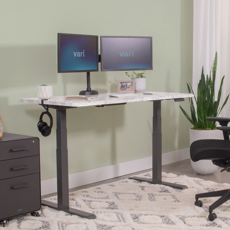 raised desk in marble and slate finish in a home office setting image number null